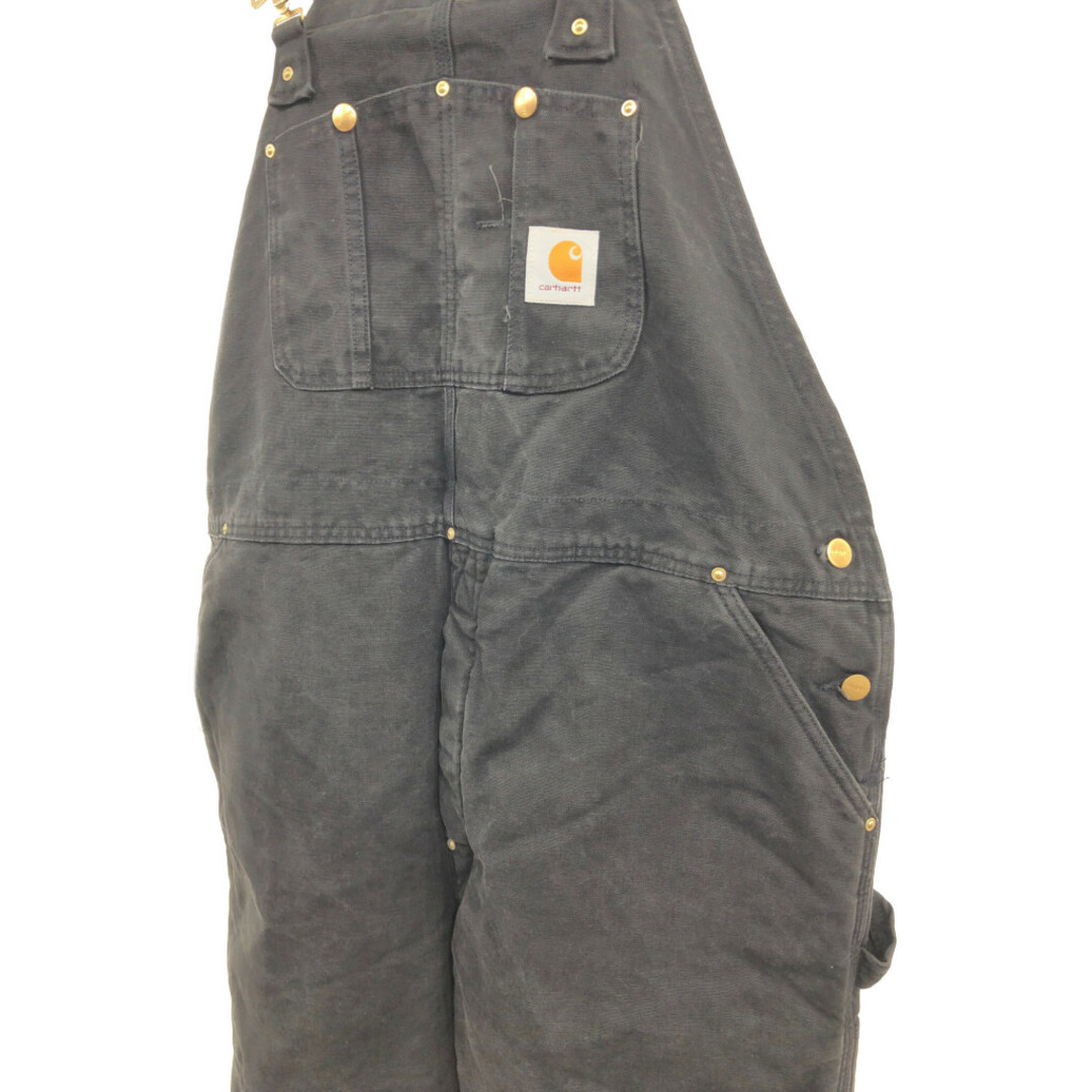 carhartt(カーハート)の90年代 USA製 Carhartt カーハート ダブルニー ビブオーバーオール ダック地 ロゴ ブラック (メンズ Ⅼ相当) 中古 古着 Q4631 メンズのパンツ(サロペット/オーバーオール)の商品写真