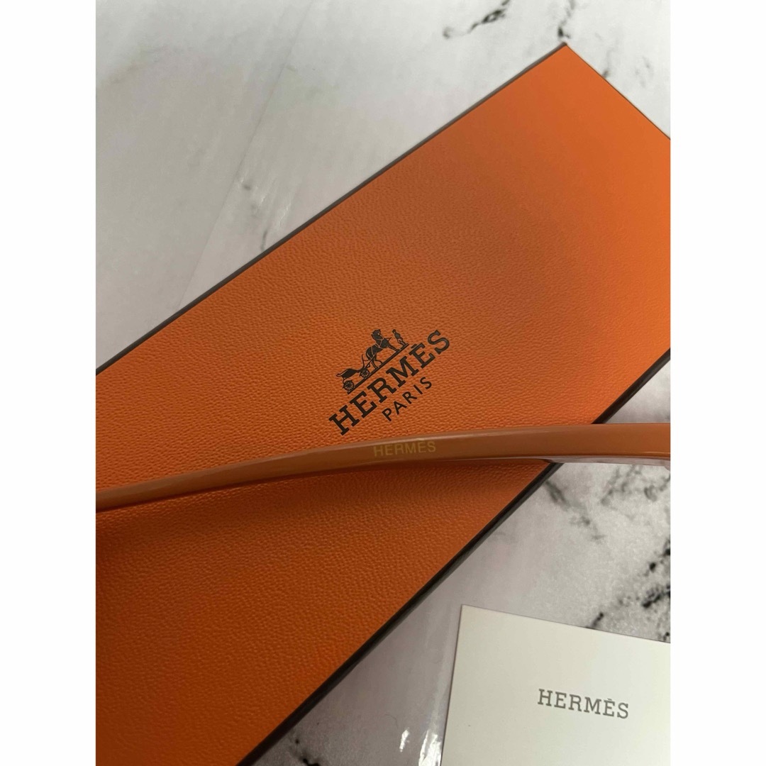 Hermes(エルメス)の【シェーヌダンクル】HERMES かんざし　オレンジ　エルメス　カード箱付き レディースのヘアアクセサリー(バレッタ/ヘアクリップ)の商品写真