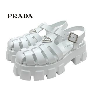 プラダ(PRADA)のプラダ PRADA モノリス サンダル 靴 シューズ ラバー ホワイト 未使用 トライアングルロゴ(サンダル)