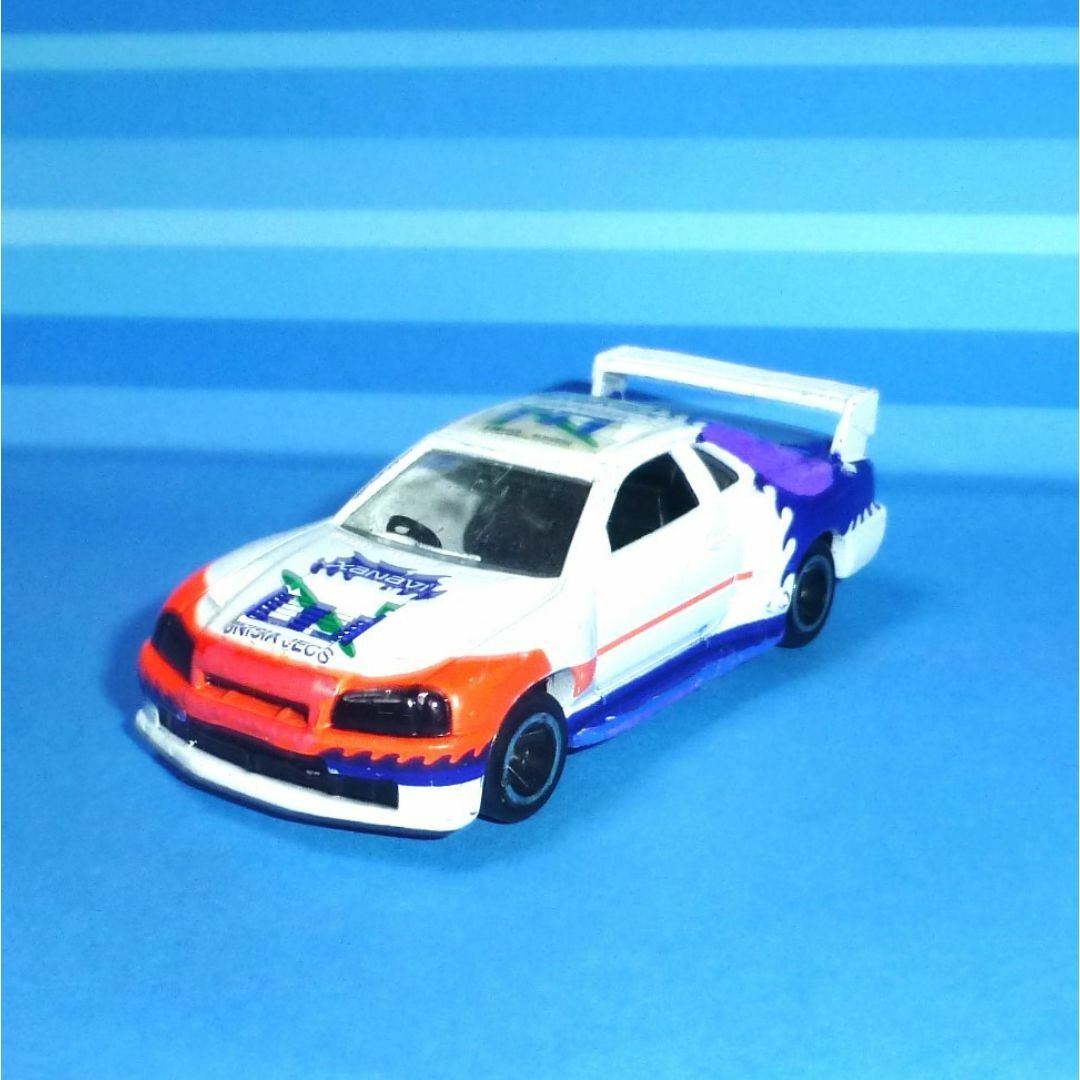 Takara Tomy(タカラトミー)のトミカ No.40 日産スカイライン レーシング(R34) エンタメ/ホビーのおもちゃ/ぬいぐるみ(ミニカー)の商品写真