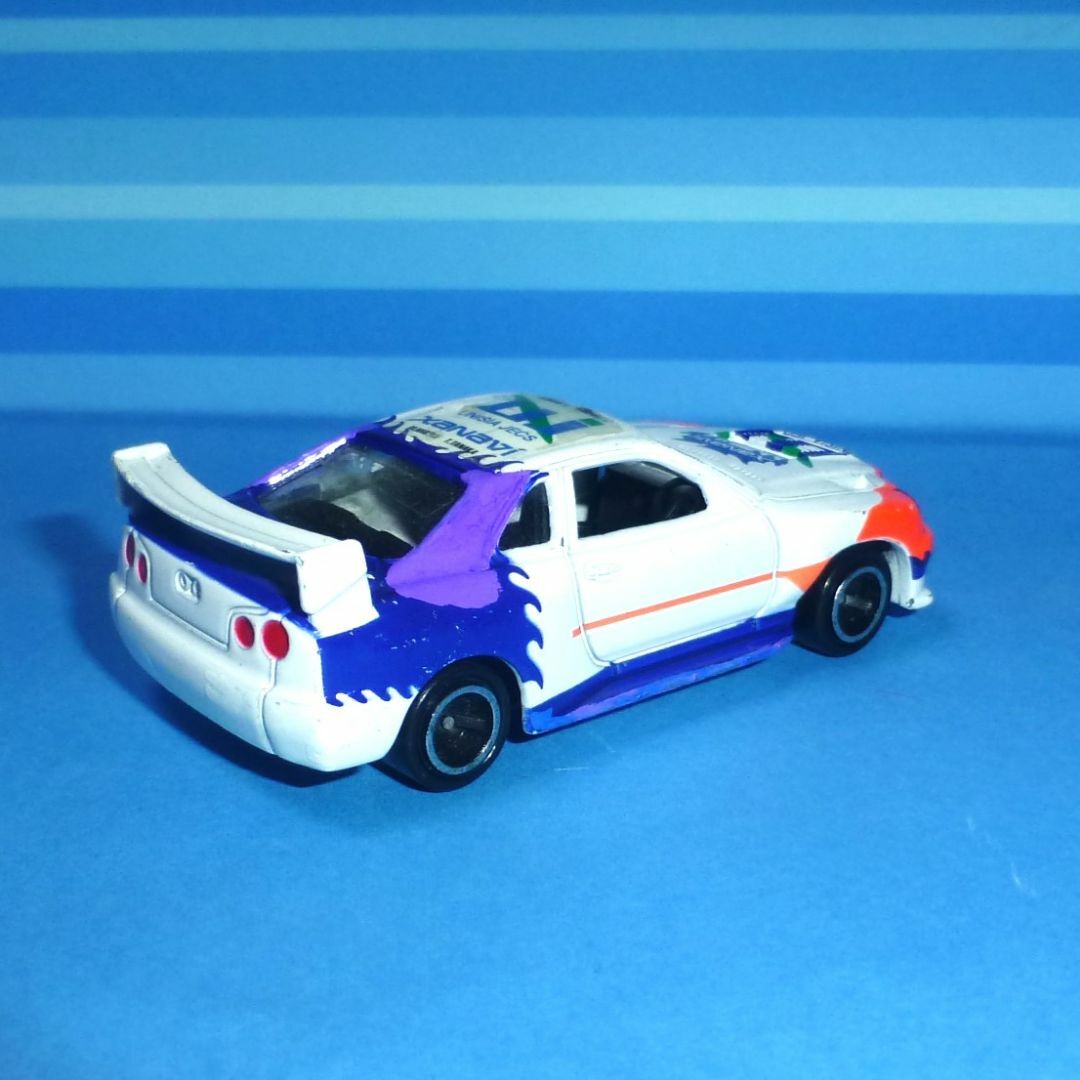 Takara Tomy(タカラトミー)のトミカ No.40 日産スカイライン レーシング(R34) エンタメ/ホビーのおもちゃ/ぬいぐるみ(ミニカー)の商品写真