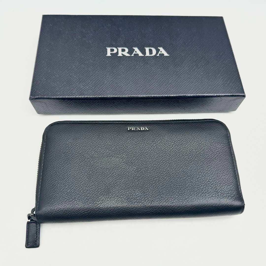 PRADA(プラダ)の【極美品・箱付き】プラダ　長財布　ラウンドジップ　メタルロゴ　レザー　シボ革　黒 メンズのファッション小物(長財布)の商品写真