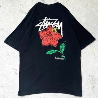 STUSSY - 【ステューシー】メキシコ製 花柄バックプリント Tシャツ 黒 stussy