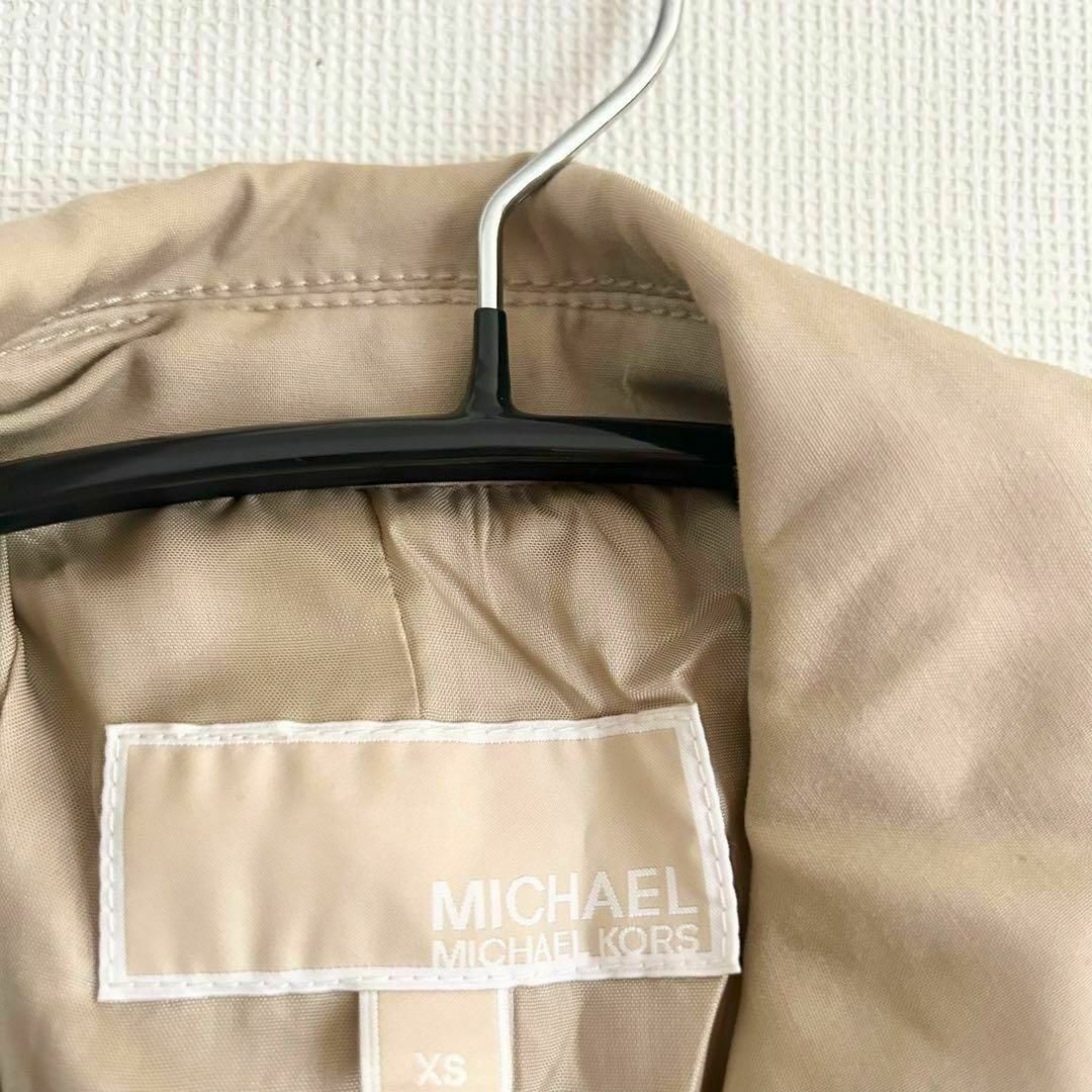 マイケル マイケルコース トレンチコート 美品 ベージュ XS ロングコート レディースのジャケット/アウター(トレンチコート)の商品写真