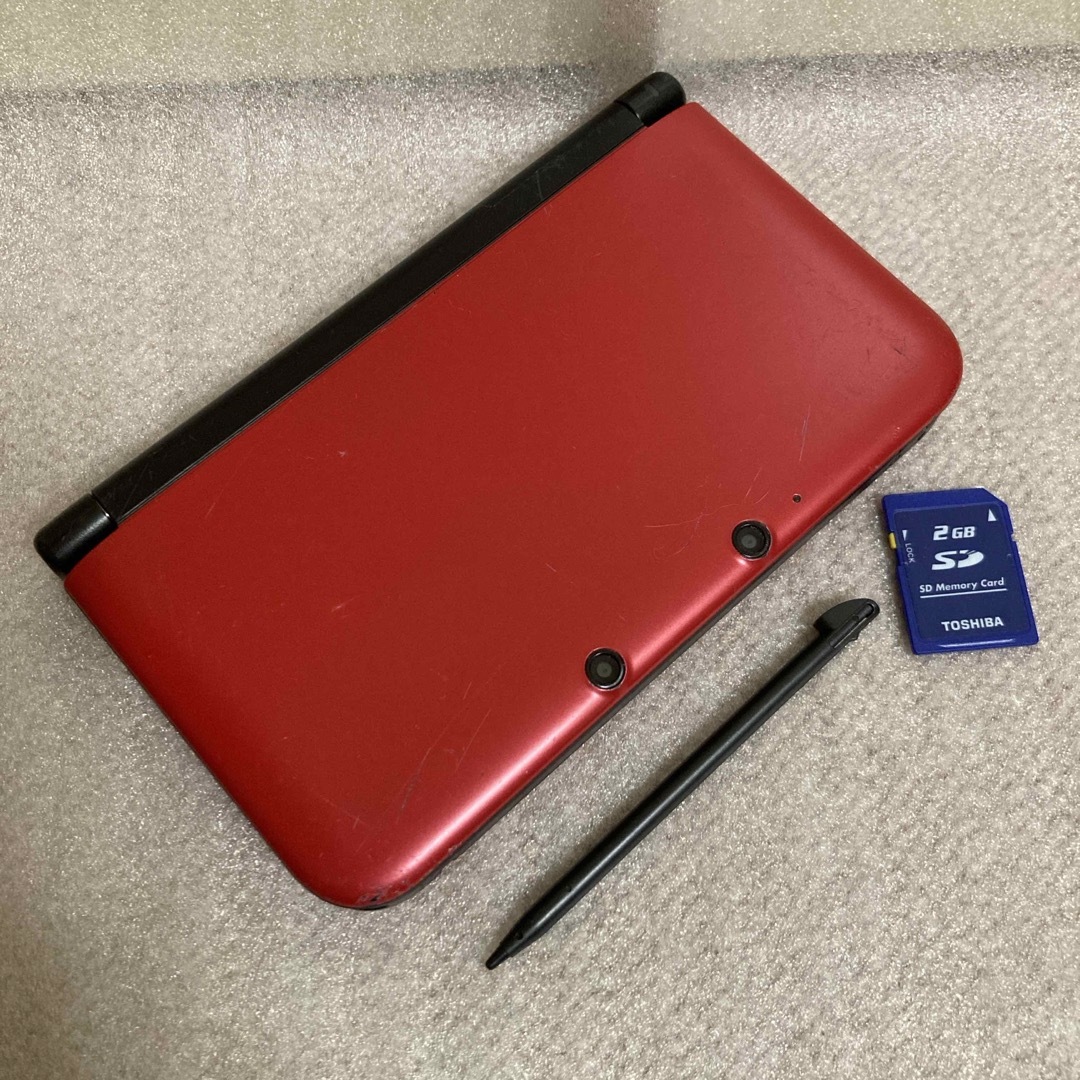 ニンテンドー3DS(ニンテンドー3DS)のニンテンドー3DS LL レッド×ブラック　ポケモンバンク・ポケムーバー エンタメ/ホビーのゲームソフト/ゲーム機本体(携帯用ゲーム機本体)の商品写真