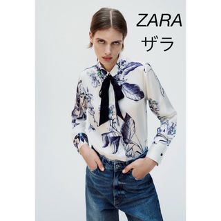 ザラ(ZARA)の【新品】ZARA ザラ リボン付きプリント柄シャツ XSサイズ(シャツ/ブラウス(長袖/七分))