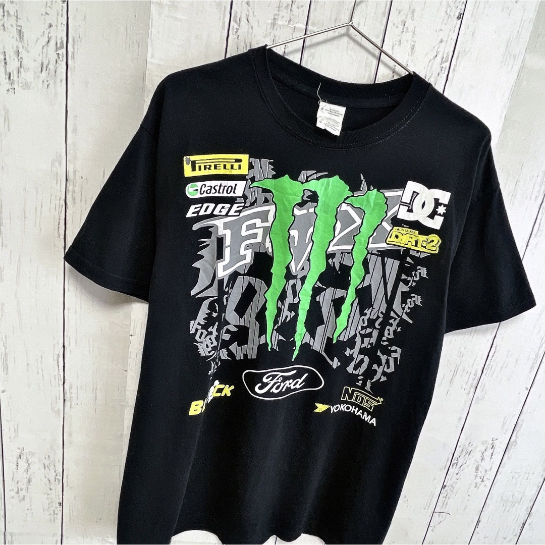 Monster Energy(モンスターエナジー)のモンスターエナジー　Tシャツ　M　ブラック　黒　プリント　ロゴ　DC　USA古着 メンズのトップス(Tシャツ/カットソー(半袖/袖なし))の商品写真