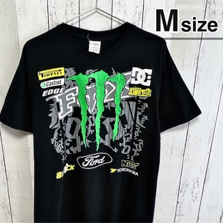モンスターエナジー(Monster Energy)のモンスターエナジー　Tシャツ　M　ブラック　黒　プリント　ロゴ　DC　USA古着(Tシャツ/カットソー(半袖/袖なし))