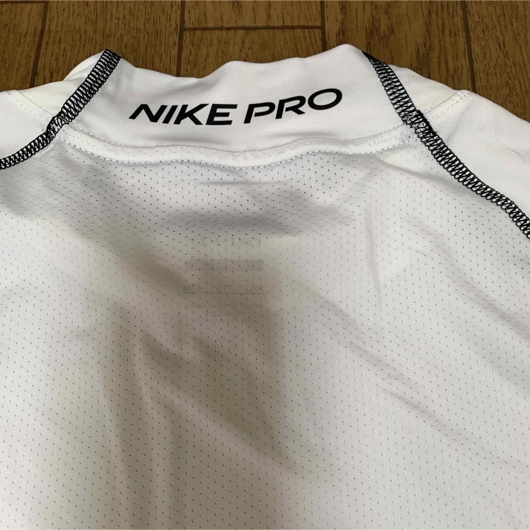 NIKE(ナイキ)の新品タグ付き　NIKE DRI FIT 長袖 Tシャツ　メンズ　2XL スポーツ/アウトドアのトレーニング/エクササイズ(トレーニング用品)の商品写真