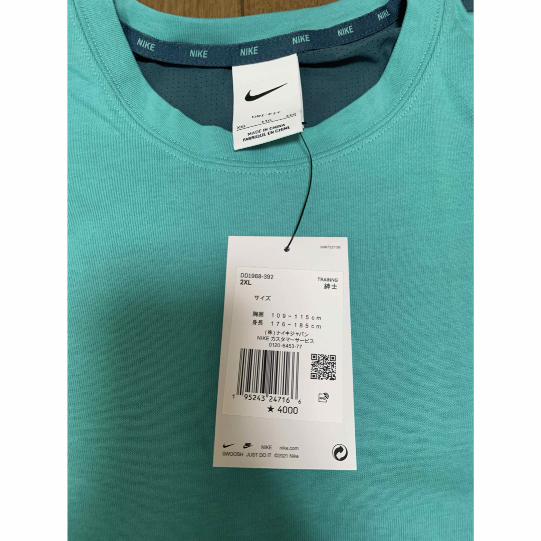 NIKE(ナイキ)の5/1まで値下げ　新品タグ付き　NIKE DRI-FIT Tシャツ　2XL スポーツ/アウトドアのトレーニング/エクササイズ(トレーニング用品)の商品写真