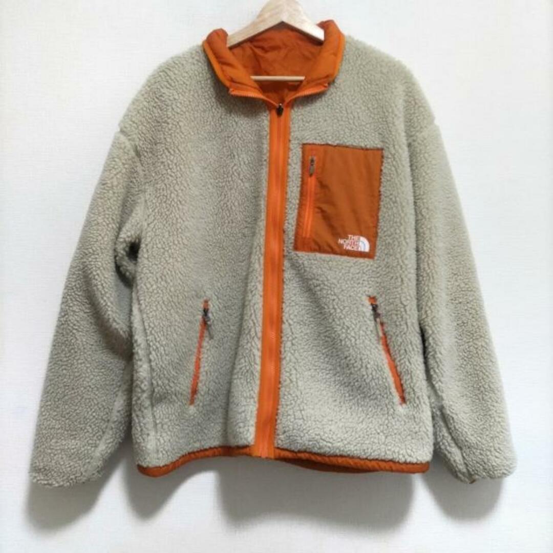 THE NORTH FACE(ザノースフェイス)のTHE NORTH FACE(ノースフェイス) ブルゾン サイズL メンズ美品  - ベージュ×オレンジ 長袖/リバーシブル/ジップアップ/春/秋 メンズのジャケット/アウター(ブルゾン)の商品写真