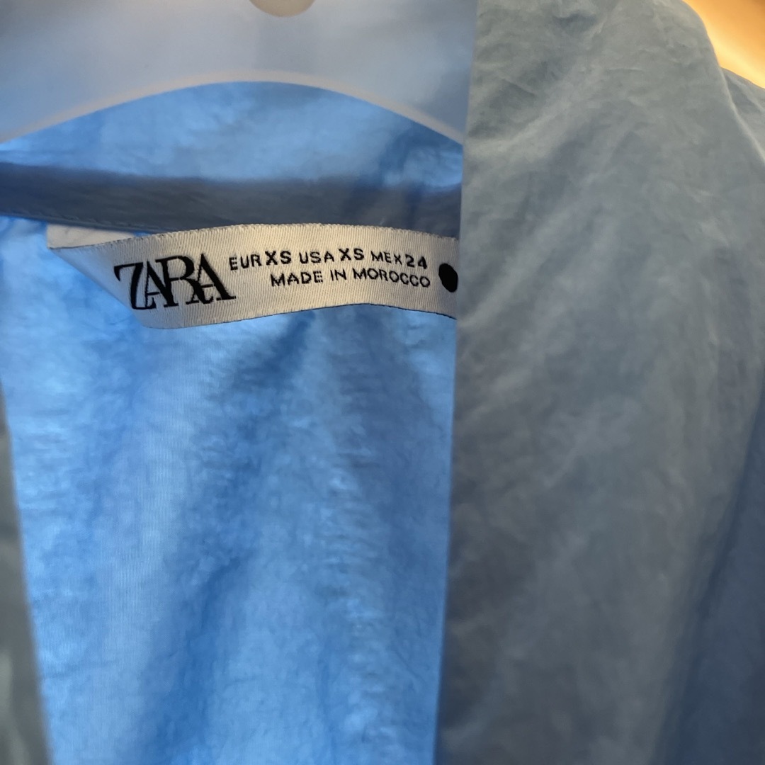 ZARA(ザラ)のZARA リボンブラウス　水色 レディースのトップス(シャツ/ブラウス(長袖/七分))の商品写真