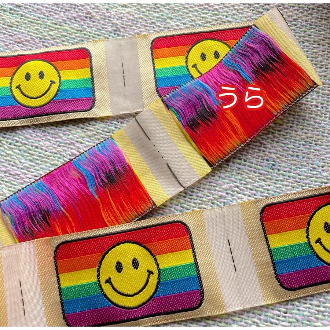 刺繍タグ　10枚セット　スマイル　にこちゃん　レインボー　虹 ハンドメイドの素材/材料(その他)の商品写真