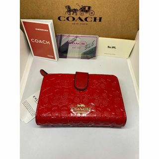 コーチ(COACH)のCOACH　コーチ　F25937　二つ折り財布　デボスド　パテントレザー　レッド(財布)