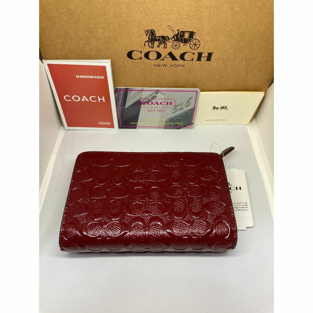 COACH(コーチ)のCOACH　コーチ　F25937　二つ折り財布　デボスド　パテントレザーチェリー レディースのファッション小物(財布)の商品写真