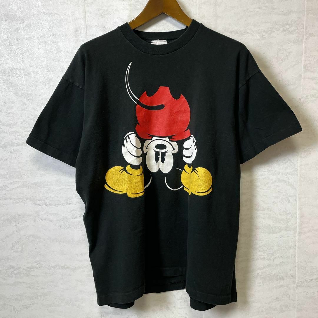 Disney(ディズニー)のメイドインUSA　ビンテージ90Ｓディズニー　シングルステッチ　黒　メンズ　古着 メンズのトップス(Tシャツ/カットソー(半袖/袖なし))の商品写真