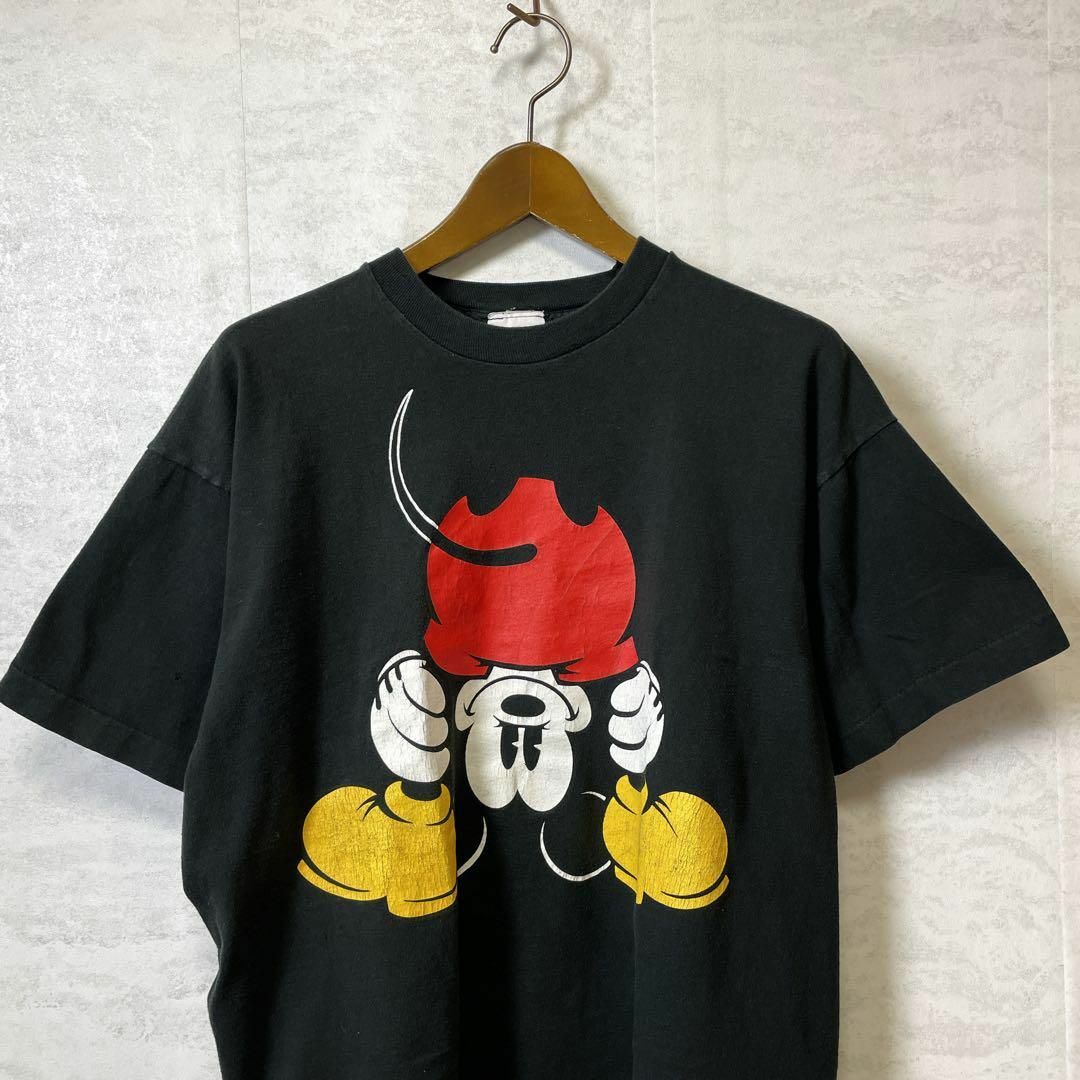 Disney(ディズニー)のメイドインUSA　ビンテージ90Ｓディズニー　シングルステッチ　黒　メンズ　古着 メンズのトップス(Tシャツ/カットソー(半袖/袖なし))の商品写真