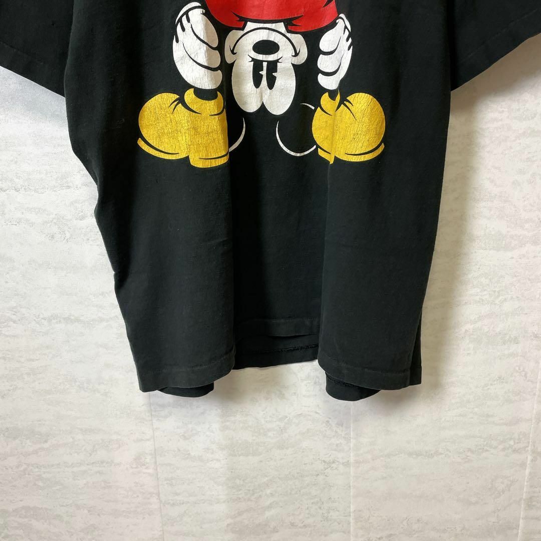 Disney(ディズニー)のメイドインUSA　ビンテージ90Ｓディズニー　シングルステッチ　黒　メンズ　古着 メンズのトップス(Tシャツ/カットソー(半袖/袖なし))の商品写真