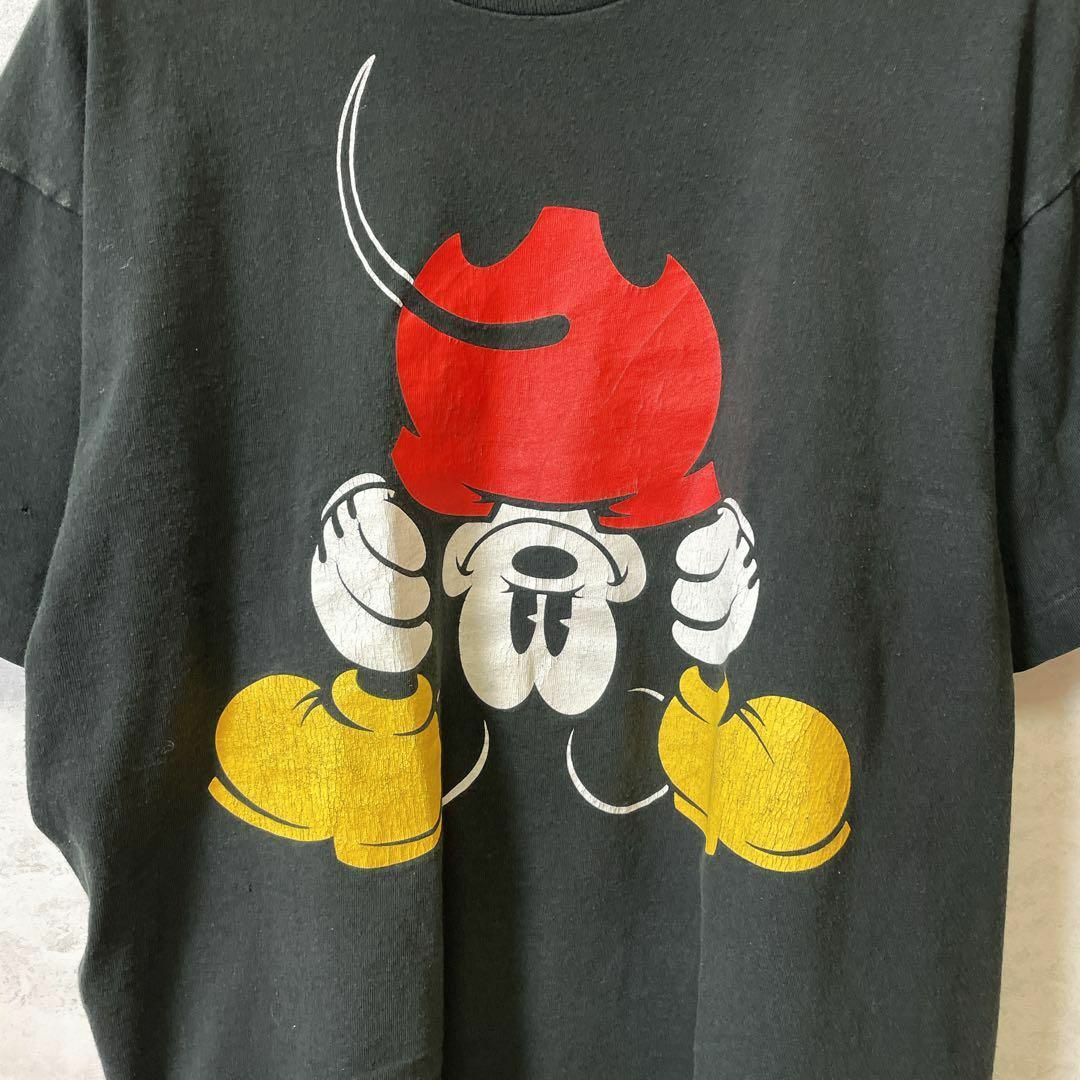 Disney(ディズニー)のメイドインUSA　ビンテージ90Ｓディズニー　シングルステッチ　黒　メンズ　古着 メンズのトップス(Tシャツ/カットソー(半袖/袖なし))の商品写真