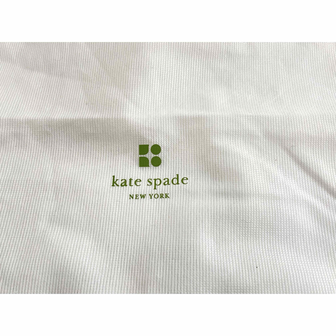 kate spade new york(ケイトスペードニューヨーク)のkate spade ケイト・スペード 保存袋 不織布 白 付属品 レディースのバッグ(ショップ袋)の商品写真