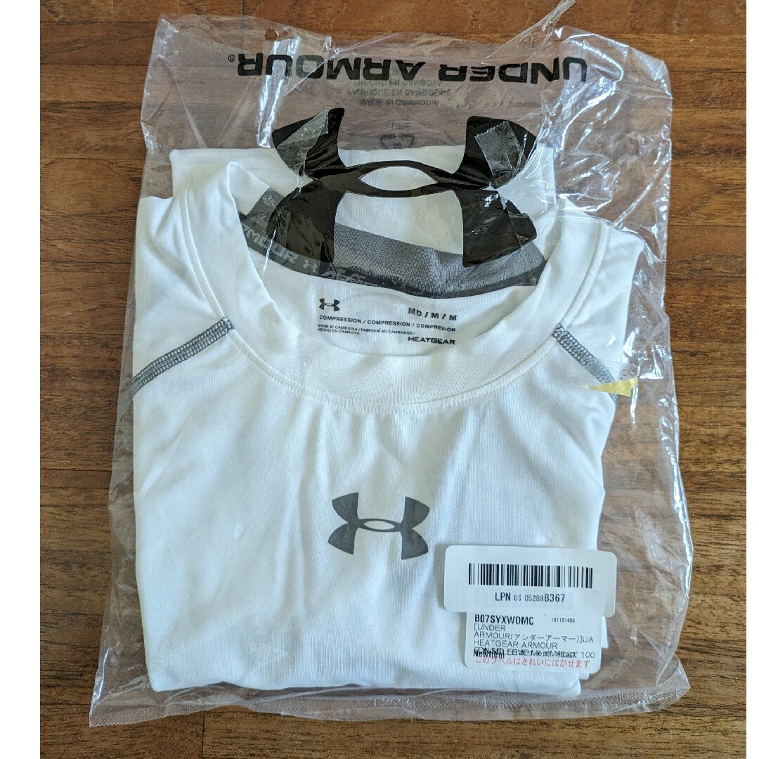 UNDER ARMOUR(アンダーアーマー)のUNDER ARMOUR/アンダーアーマー ヒートギア 白 Mサイズ 未使用品 メンズのトップス(Tシャツ/カットソー(七分/長袖))の商品写真