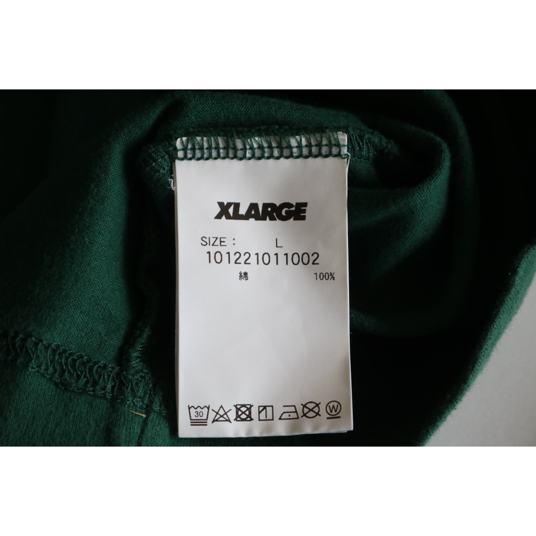 XLARGE(エクストララージ)の【XLARGE】長袖Tシャツ　正面文字ロゴ　背面キャラロゴ　カーキ　L★ メンズのトップス(Tシャツ/カットソー(七分/長袖))の商品写真