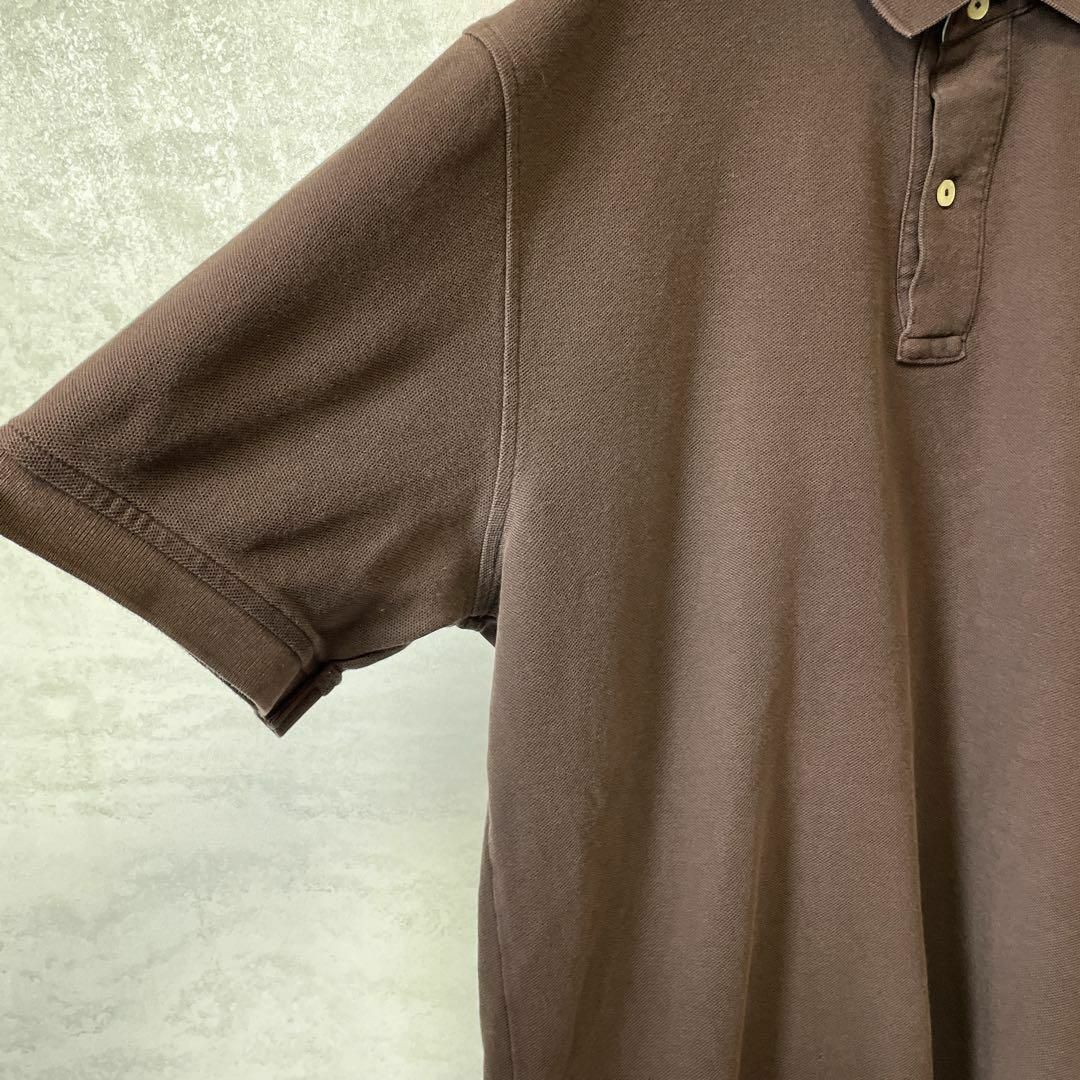 TOMMY HILFIGER(トミーヒルフィガー)のトミーヒルフィガー　オーバーサイズＬ　茶色ブラウン　アースカラー　無地メンズ古着 メンズのトップス(ポロシャツ)の商品写真