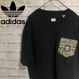 オリジナルス(Originals（adidas）)のXL⭐️adidas 迷彩柄&トレファイルロゴ ポケット Tシャツ ブラック(Tシャツ/カットソー(半袖/袖なし))