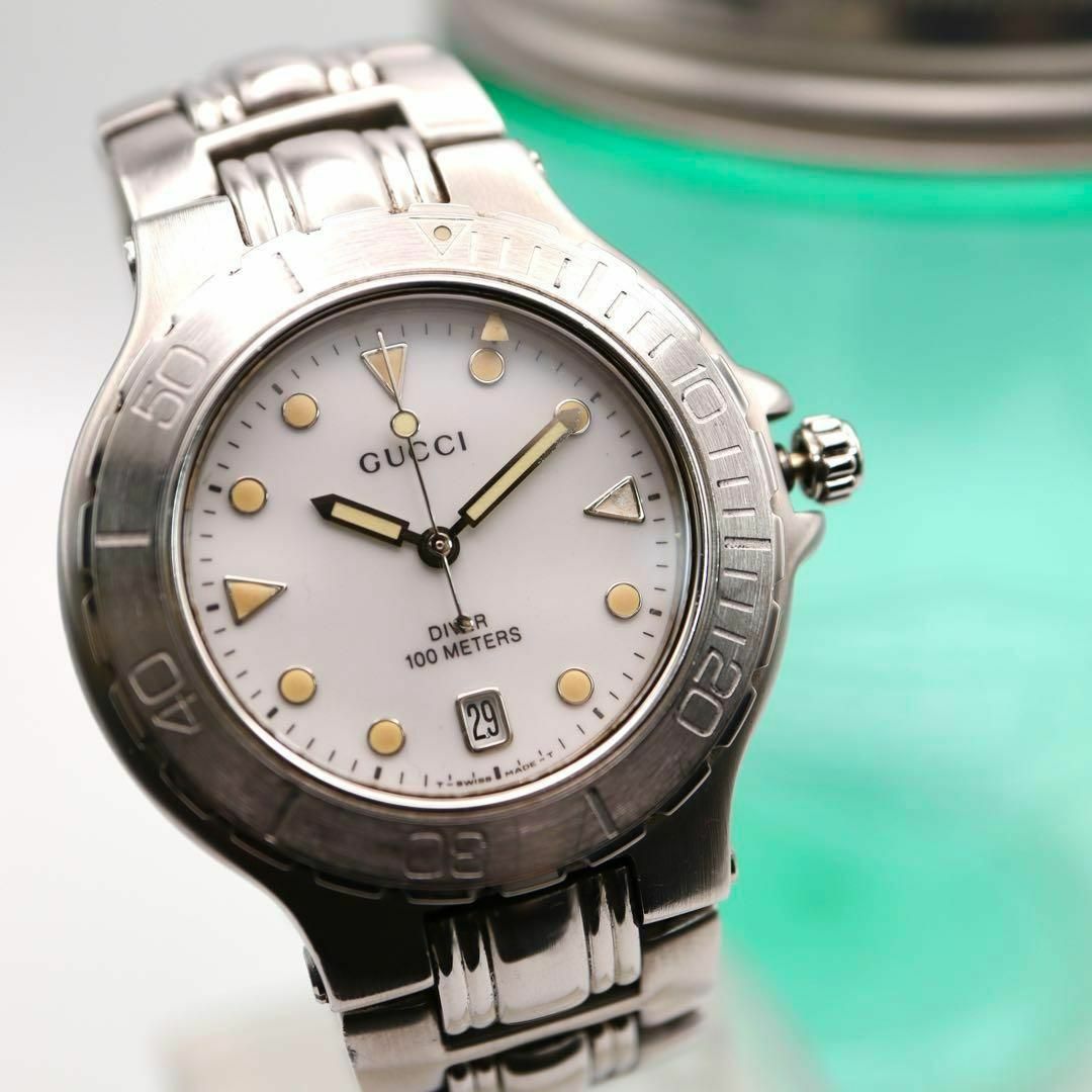 Gucci(グッチ)の良品！GUCCI デイト ダイバーウォッチ ラウンド メンズ腕時計 557 メンズの時計(腕時計(アナログ))の商品写真