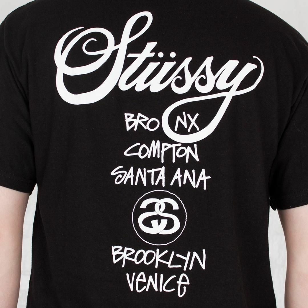 STUSSY(ステューシー)のステューシー STUSSY WORLD TOUR Tee L 黒　ブラック メンズのトップス(Tシャツ/カットソー(半袖/袖なし))の商品写真