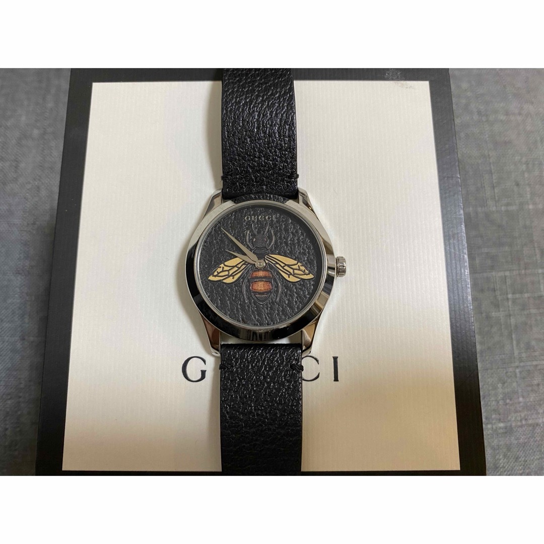 Gucci(グッチ)のGUCCI グッチ 腕時計 黒 ハチ bee メンズの時計(腕時計(アナログ))の商品写真