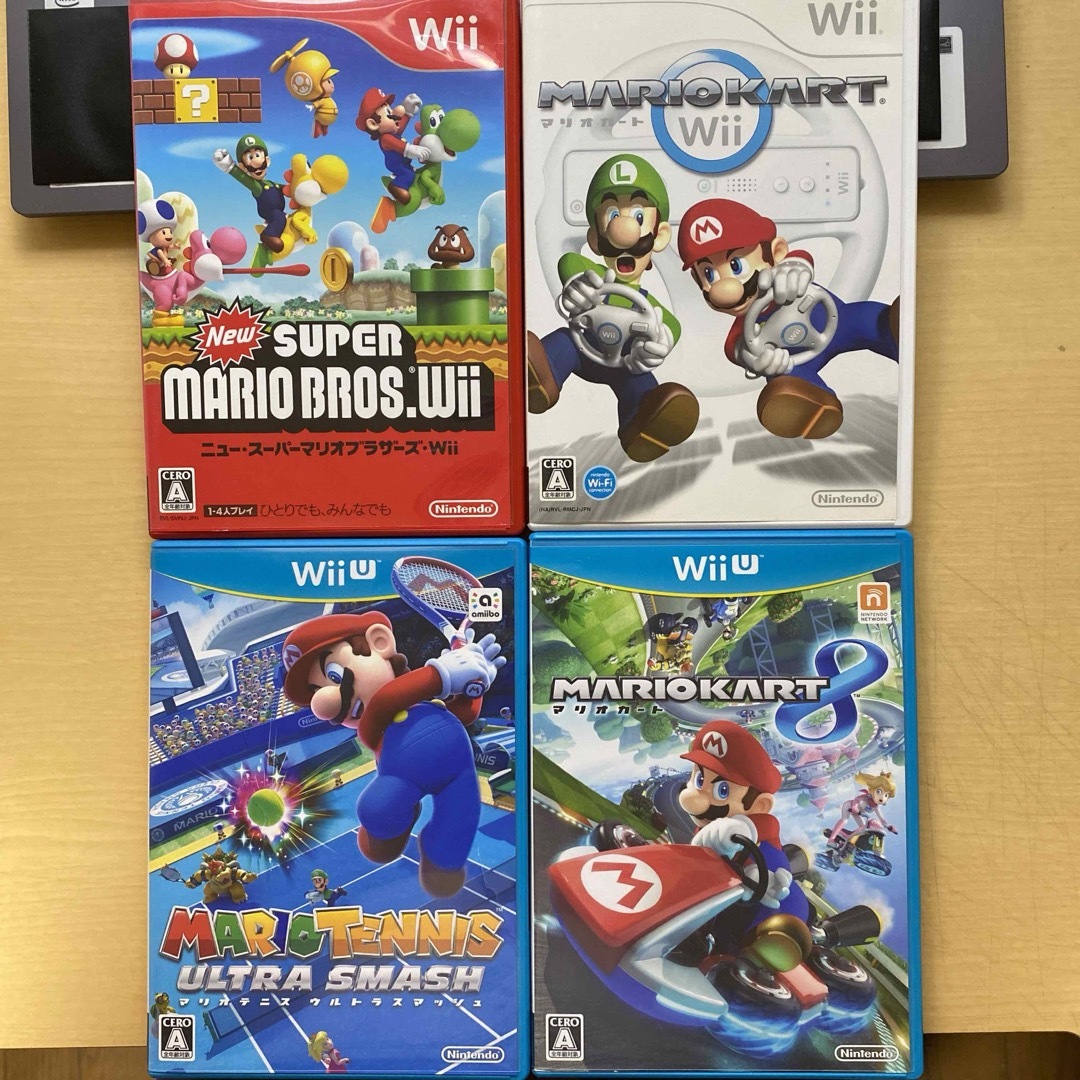 任天堂(ニンテンドウ)のWii WiiU マリオ4本セット　マリオカート　マリオテニス　スーマリ エンタメ/ホビーのフィギュア(アニメ/ゲーム)の商品写真