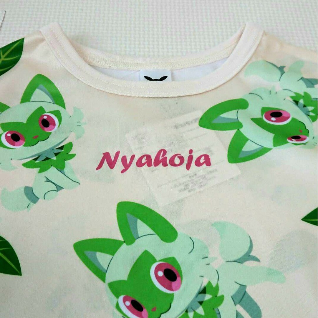 ポケモン(ポケモン)のポケモン 110cm 半袖シャツ Tシャツ ニャオハ 新品タグあり ラブリー キッズ/ベビー/マタニティのキッズ服女の子用(90cm~)(Tシャツ/カットソー)の商品写真