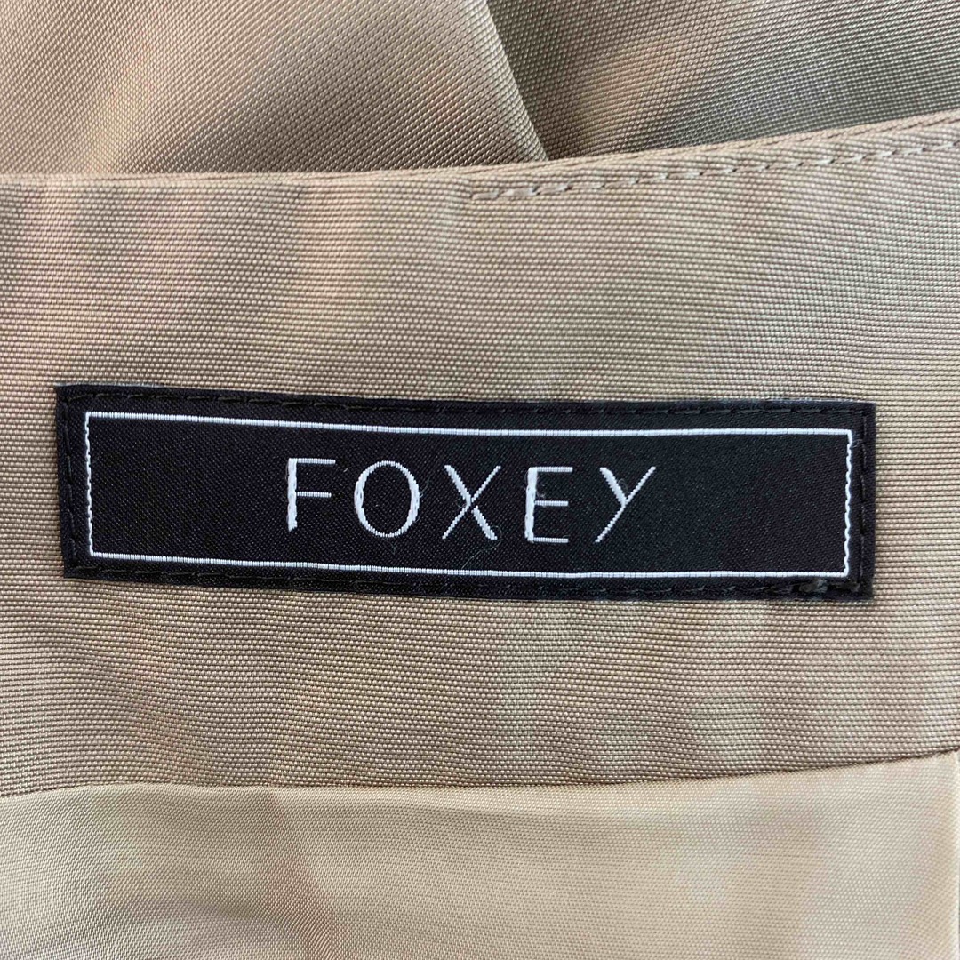 FOXEY(フォクシー)のFOXEY フォクシー レディース ひざ丈スカート　ベージュ　裏地　台形 レディースのスカート(ひざ丈スカート)の商品写真