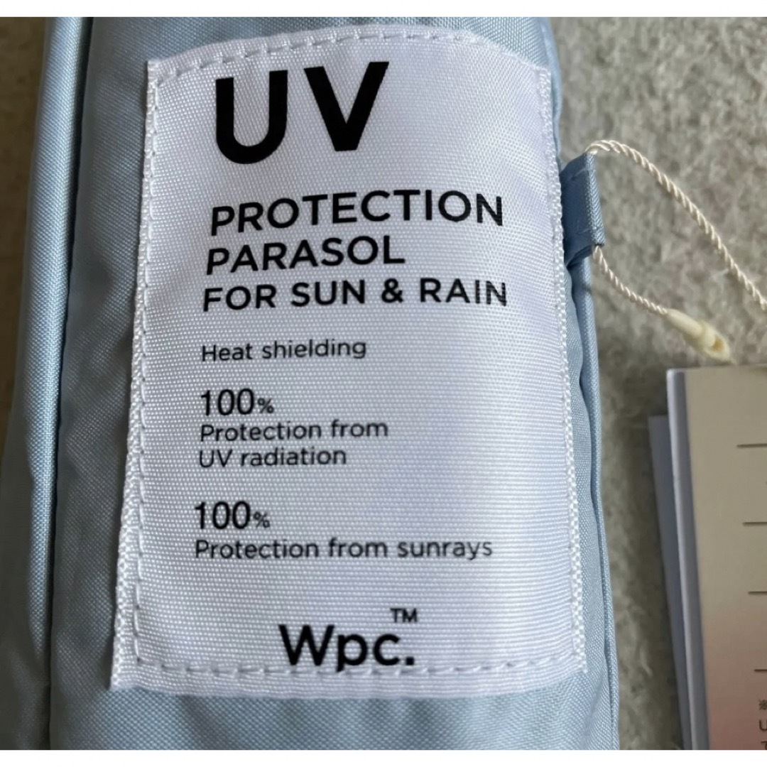 Wpc.(ダブルピーシー)のWpc. 遮光インサイドカラーtiny  サックス　日傘 折りたたみ レディースのファッション小物(傘)の商品写真