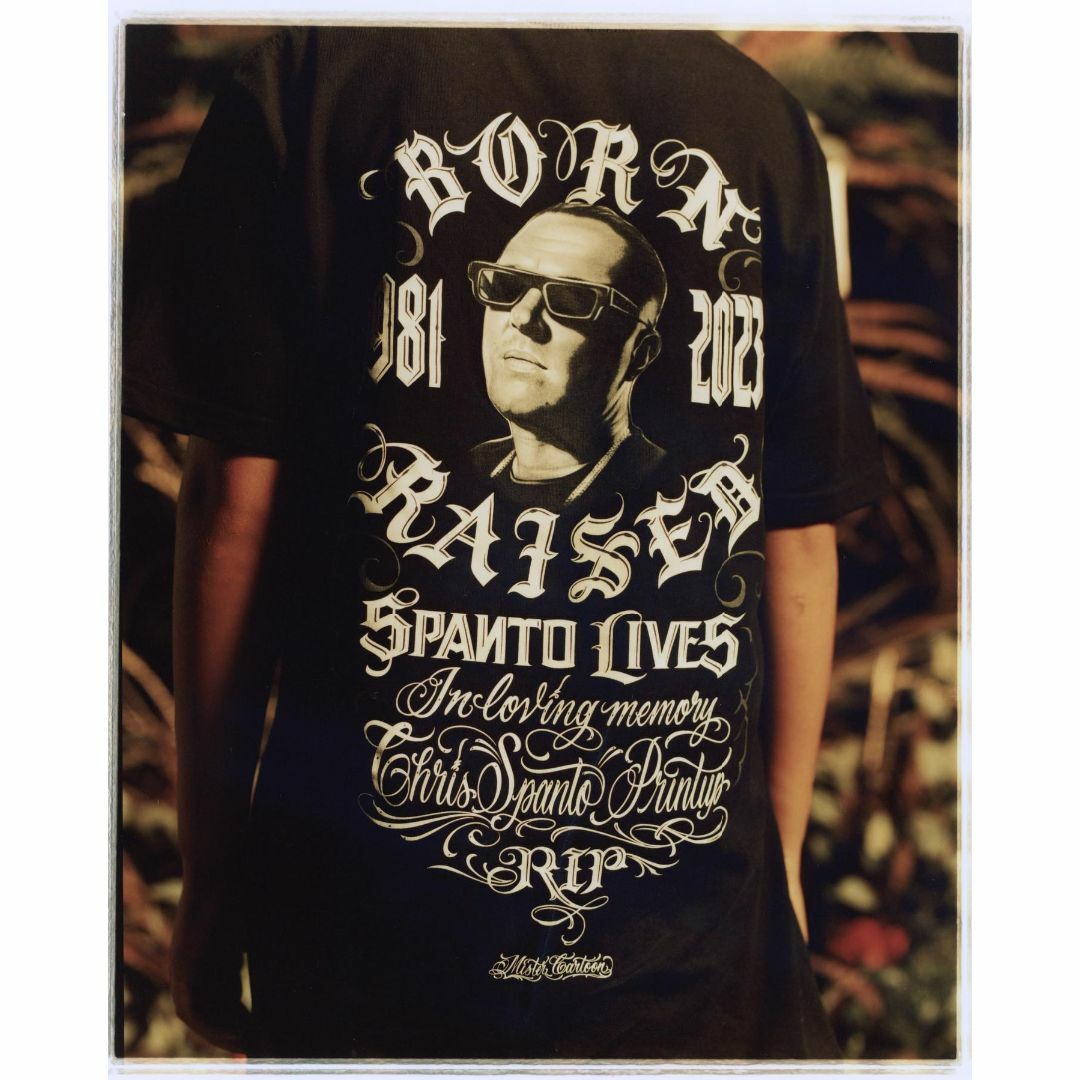 Mr Cartoon BORN RAISED SPANTO LIVE TEE 黒 メンズのトップス(Tシャツ/カットソー(半袖/袖なし))の商品写真