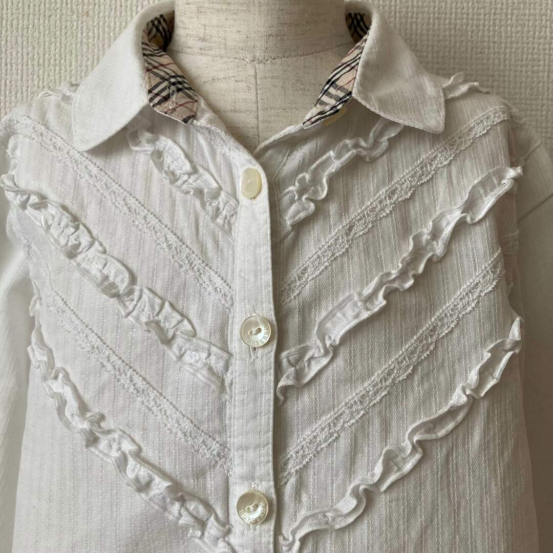 BURBERRY(バーバリー)のBURBERRY  バーバリー フリル付き 白ブラウス 袖リボン 120cm キッズ/ベビー/マタニティのキッズ服女の子用(90cm~)(ブラウス)の商品写真