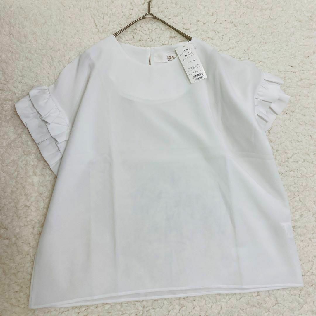 TOCCO closet(トッコクローゼット)の【未使用タグ付き】トッコクローゼット　 お袖ティアードフリル華奢見えブラウス レディースのトップス(シャツ/ブラウス(半袖/袖なし))の商品写真