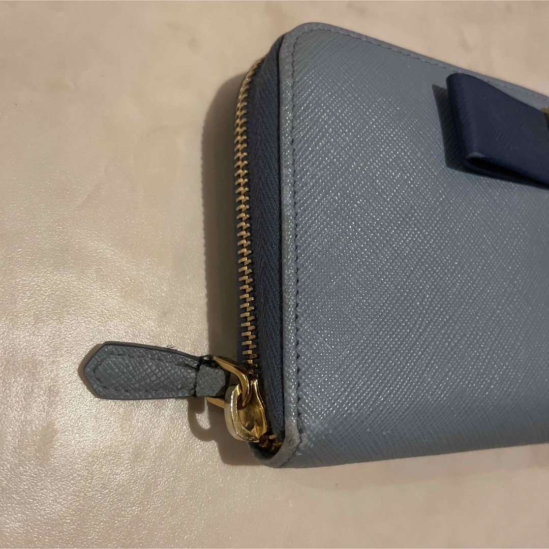 PRADA(プラダ)のPRADA プラダ 長財布　ラウンドファスナー　リボン　ライトブルー レディースのファッション小物(財布)の商品写真