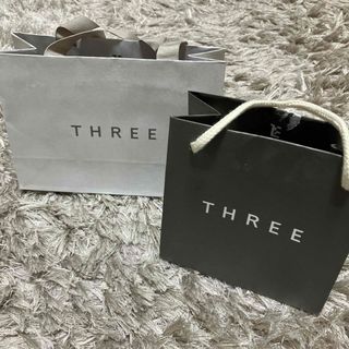 スリー(THREE)のTHREE：スリー　ショッパー　紙袋(ショップ袋)