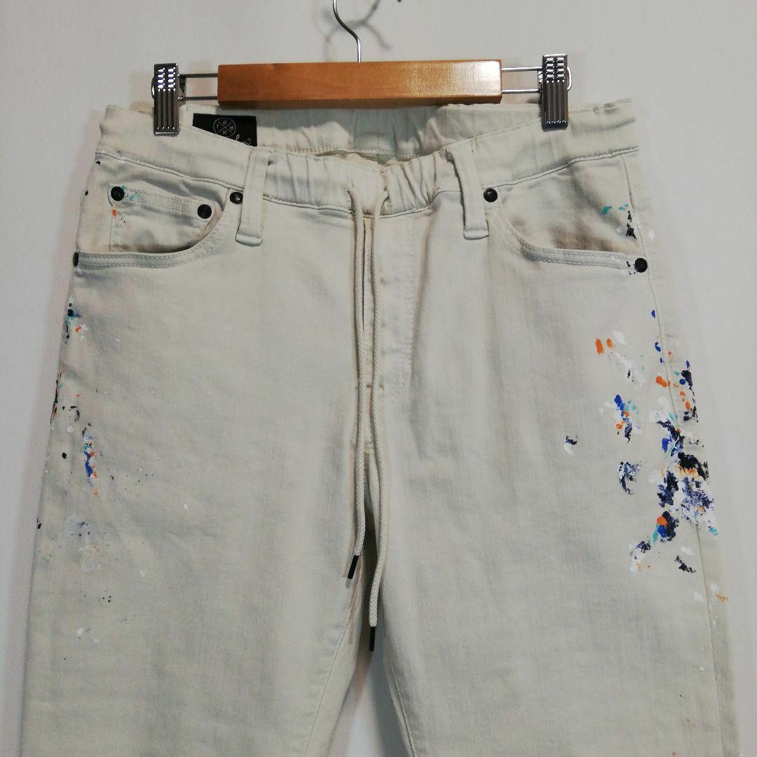 SURT(サート)のSURT ビッグジョン ジョガーパンツ スリムパンツ デニムパンツ サート 白系 メンズのパンツ(デニム/ジーンズ)の商品写真