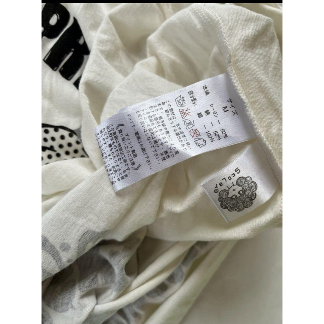ScoLar(スカラー)のスカラー　ラメ花　蝶　チュニックトップス レディースのトップス(Tシャツ(長袖/七分))の商品写真
