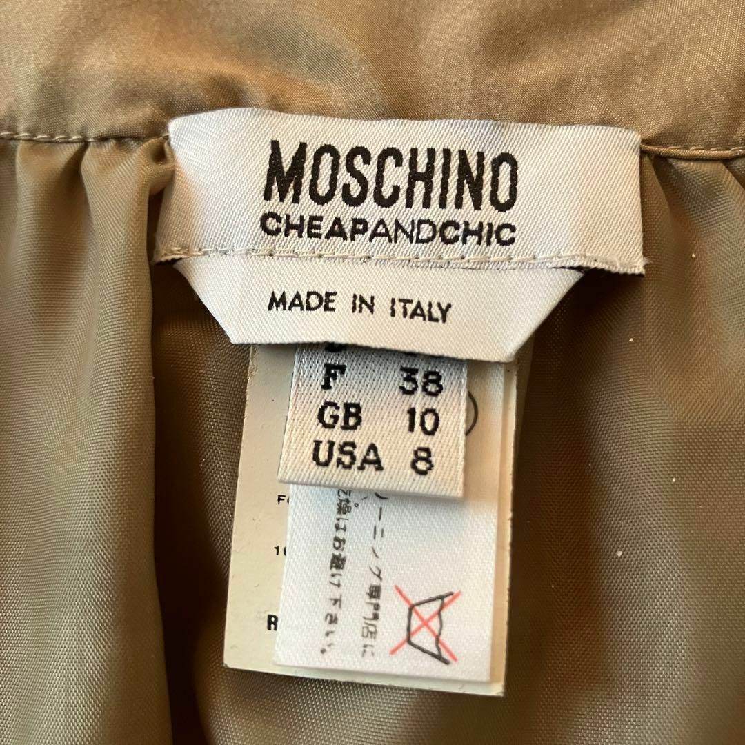 MOSCHINO(モスキーノ)のMOSCHINO シルクプリーツフレアワンピース ドレス L ベージュ リボン レディースのワンピース(ひざ丈ワンピース)の商品写真