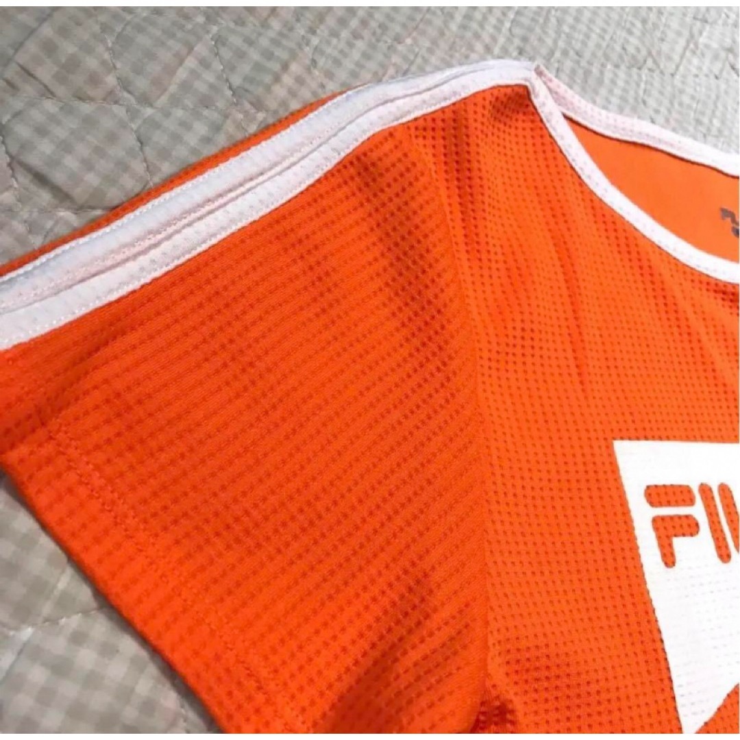 FILA(フィラ)のFILA  オレンジ　スポーツ　Tシャツ　Mサイズ　美品 レディースのトップス(Tシャツ(半袖/袖なし))の商品写真