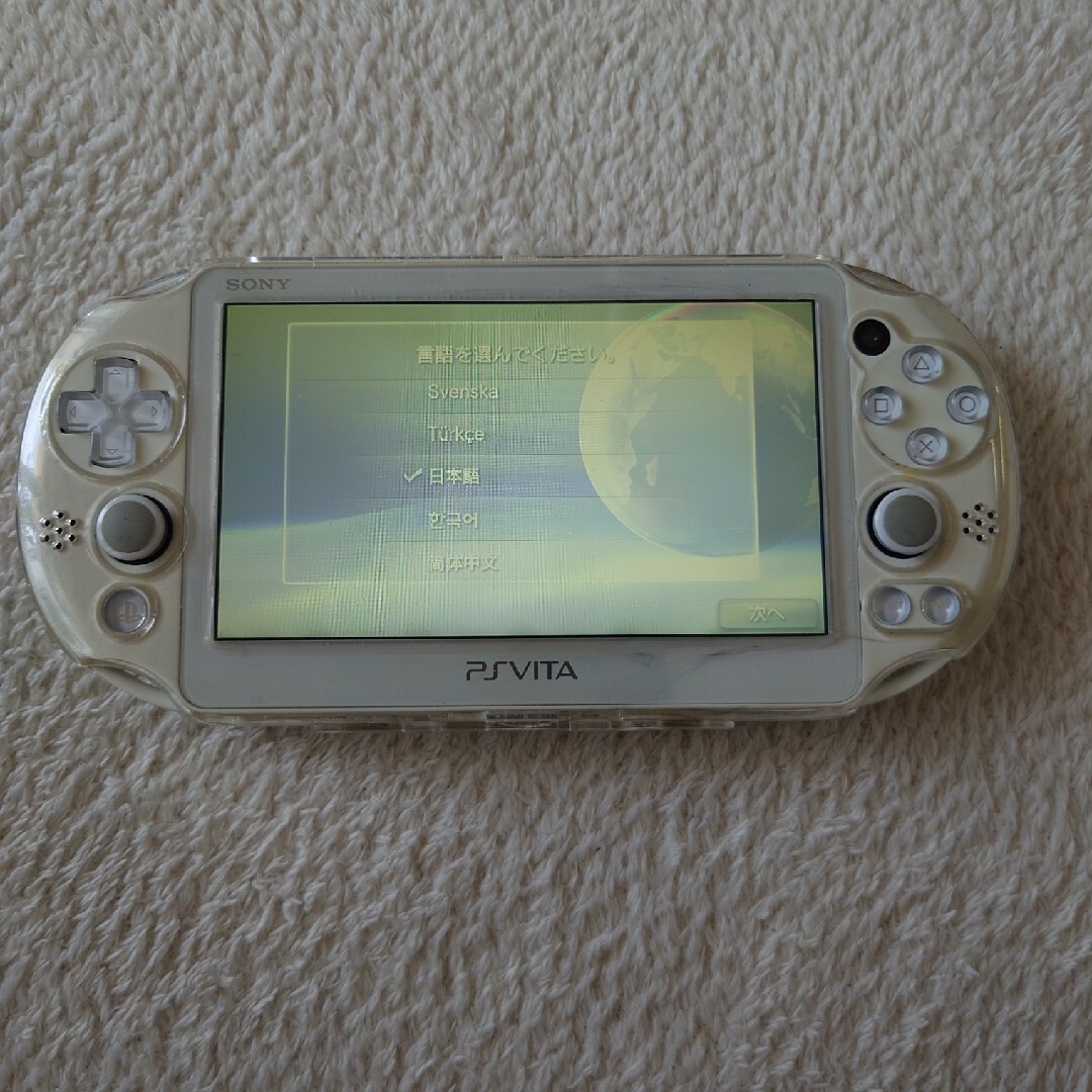 SONY(ソニー)のPS VITA ホワイト　PCH-2000 エンタメ/ホビーのゲームソフト/ゲーム機本体(携帯用ゲーム機本体)の商品写真