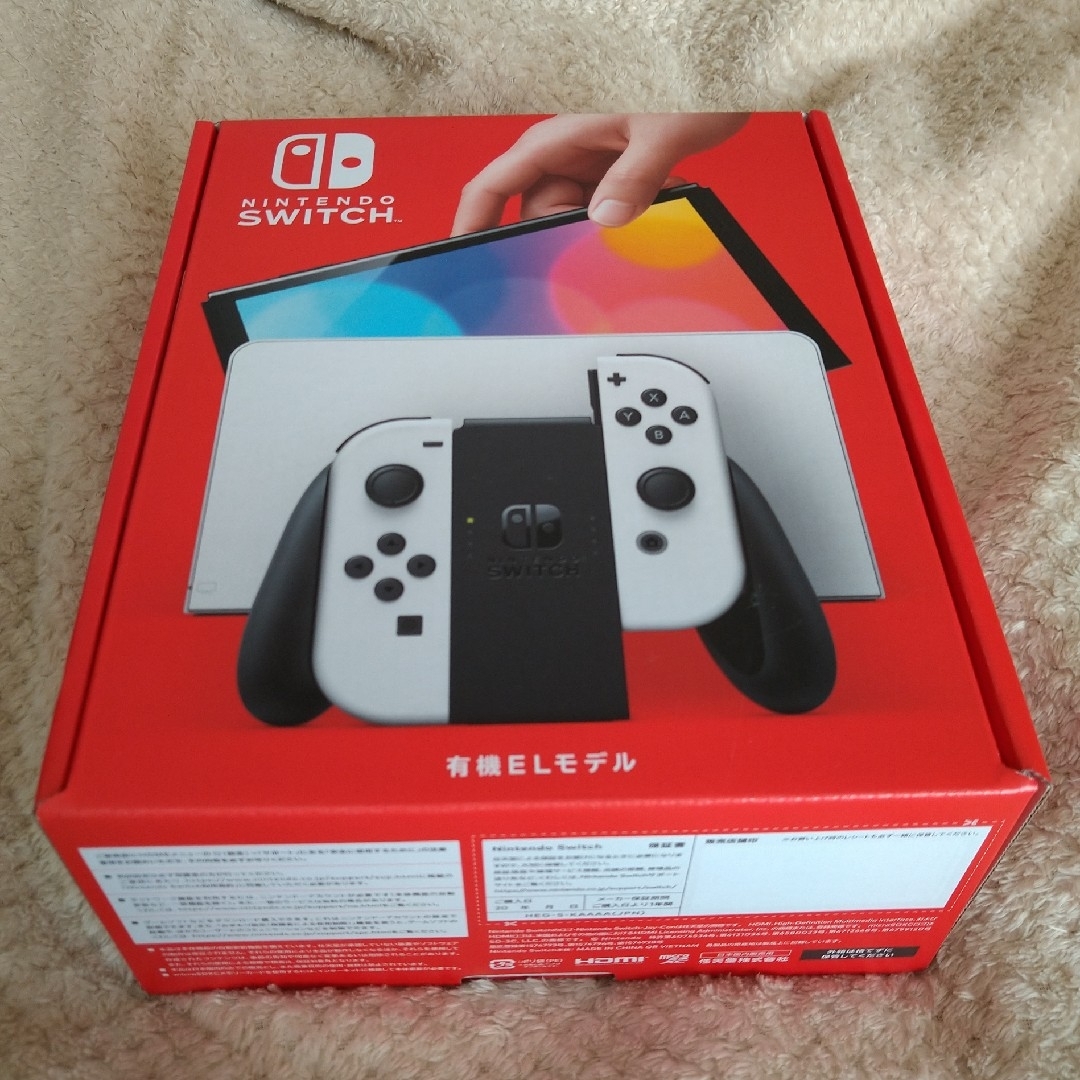 Nintendo Switch(ニンテンドースイッチ)の(保証書欄印なし)スイッチ本体有機ELホワイト★新品未開封★匿名送料無料★ エンタメ/ホビーのゲームソフト/ゲーム機本体(家庭用ゲーム機本体)の商品写真