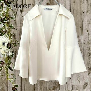 アドーア(ADORE)のADORE シャツ ブラウス 七分袖 スキッパー ベルスリーブ アイボリー 38(Tシャツ(長袖/七分))