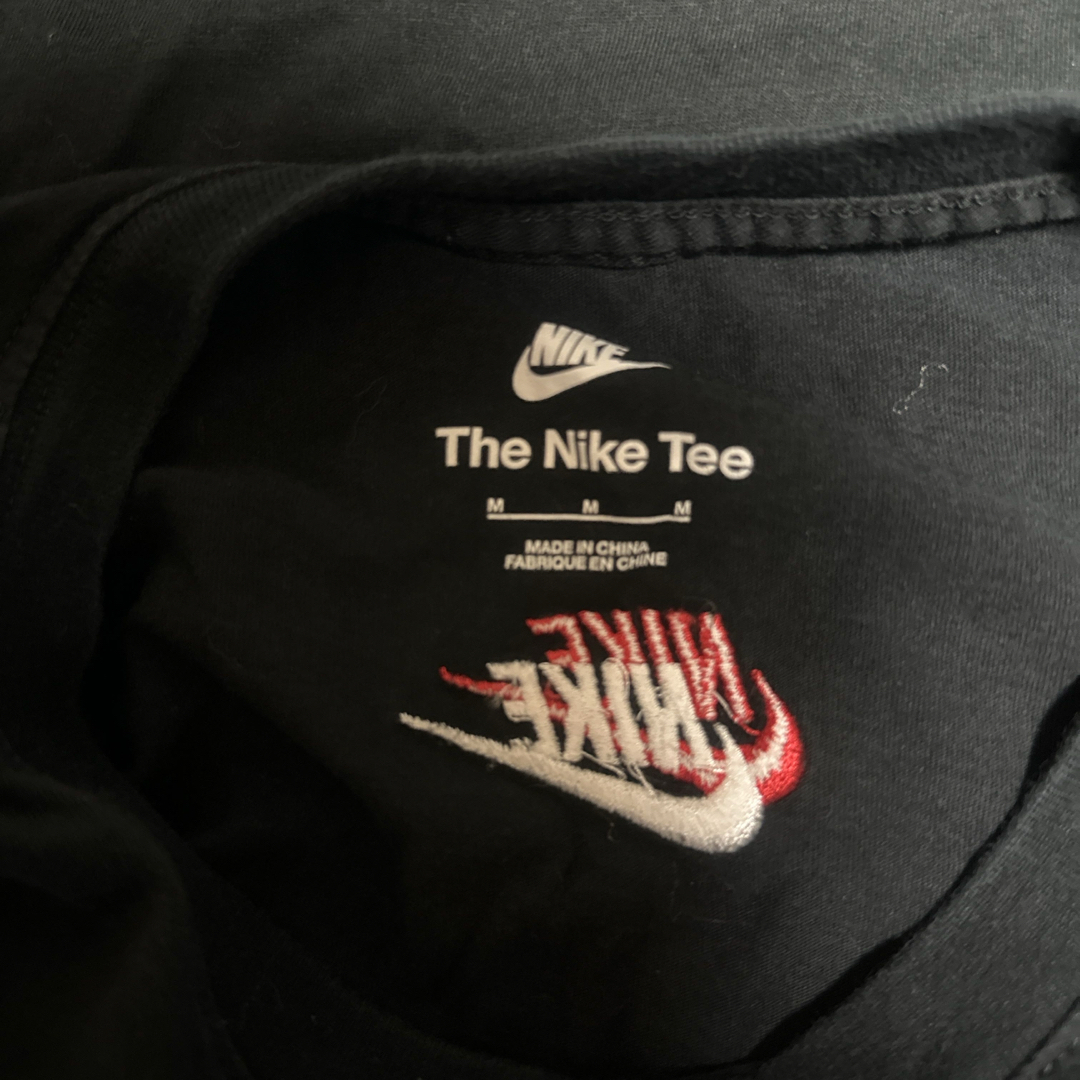 NIKE(ナイキ)のNIKE Ｔシャツ　M レディースのトップス(Tシャツ(長袖/七分))の商品写真