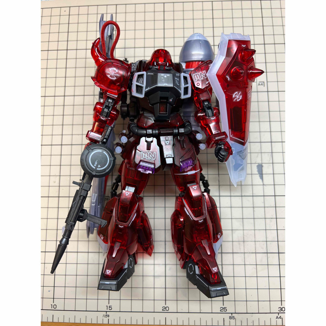 BANDAI(バンダイ)のMG ガナーザクウォーリアルナマリア専用機クリアカラー　ガンプラ完成品 エンタメ/ホビーのおもちゃ/ぬいぐるみ(模型/プラモデル)の商品写真