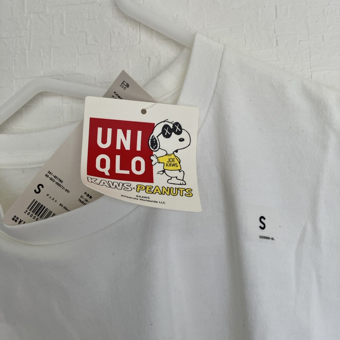 UNIQLO(ユニクロ)の新品未使用　カウズ　KAWS ×PEANUTS×ユニクロ　ウッドストック レディースのトップス(Tシャツ(半袖/袖なし))の商品写真